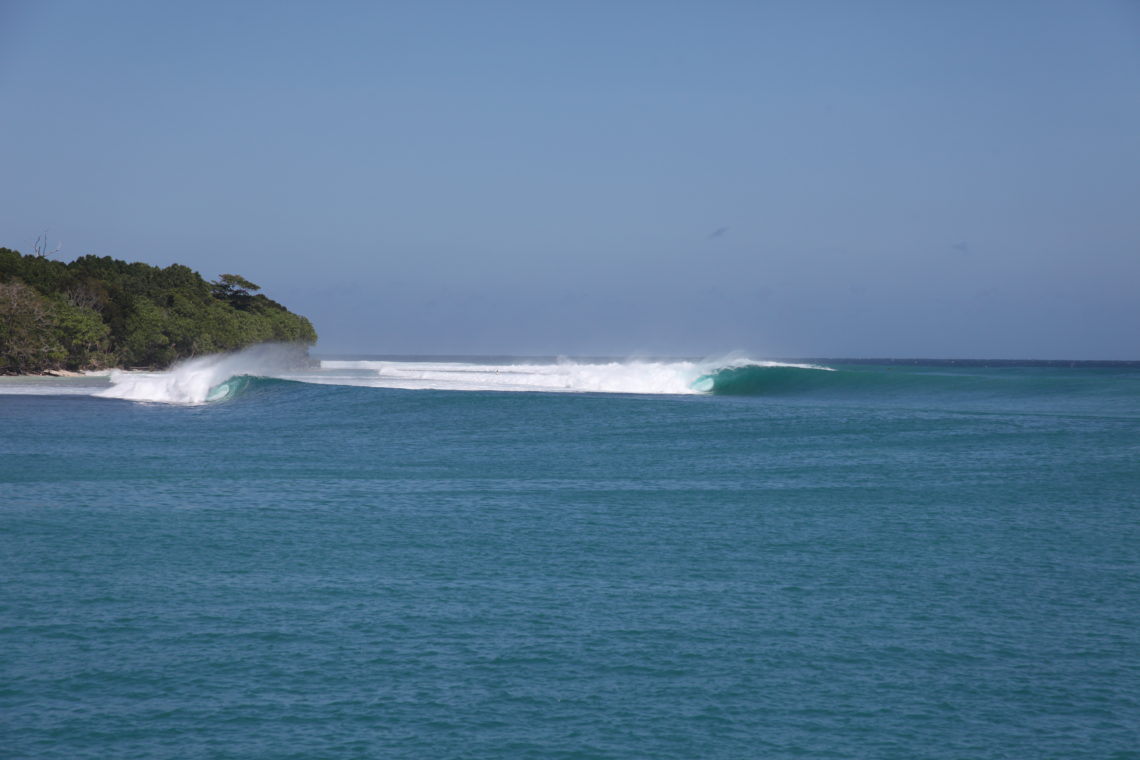 Surf on a perfect barrel wave of Mentawai